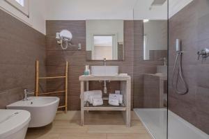 Koupelna v ubytování Hotel Soffio D'Estate