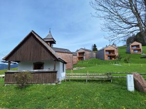 A garden outside Wohnung Rheintal im Alpenvorland