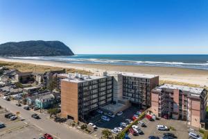 an aerial view of a hotel and the beach at Sand and Sea #304 in Seaside