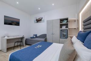 Postel nebo postele na pokoji v ubytování Hotel Soffio D'Estate