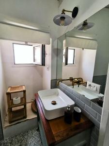 Ванна кімната в Nòstos