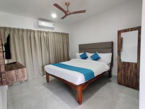 Postel nebo postele na pokoji v ubytování Hotel MJ Beach Resort Baga
