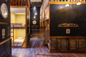 a hallway with a room with a bunk bed at The Clock Hostel & Suites in Cartagena de Indias