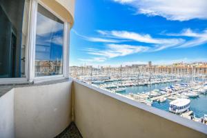 balcón con vistas al puerto deportivo en Vieux-Port - Vue exceptionnelle - 2 ch et clim, en Marsella