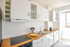 Una cocina o zona de cocina en Vieux-Port - Vue exceptionnelle - 2 ch et clim