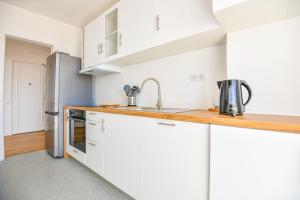 Una cocina o zona de cocina en Vieux-Port - Vue exceptionnelle - 2 ch et clim