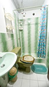 Koupelna v ubytování Habitación con baño privado