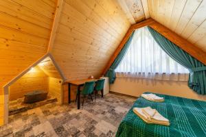 Posteľ alebo postele v izbe v ubytovaní Willa Folk Prestige