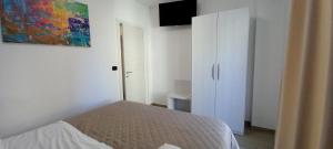Postel nebo postele na pokoji v ubytování Maresol Residence