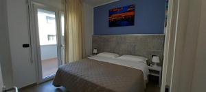 Postel nebo postele na pokoji v ubytování Maresol Residence