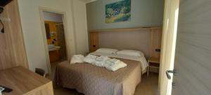 Postel nebo postele na pokoji v ubytování Maresol Residence
