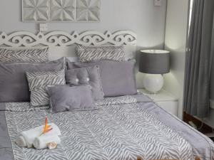 Ένα ή περισσότερα κρεβάτια σε δωμάτιο στο Sutton Place Hotel
