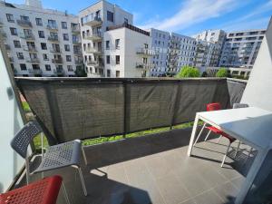En balkon eller terrasse på FIRST -- Green Żoliborz apartment 3