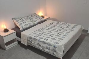 Postel nebo postele na pokoji v ubytování Appartement cosy de 2 chambres