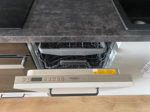 Kuchnia lub aneks kuchenny w obiekcie Apartament Dekerta garaż, duży taras, smart tv