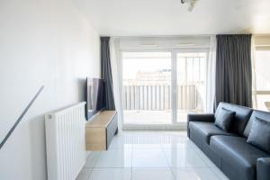 Χώρος καθιστικού στο beautiful 2 bedroom apartment 40 min from Paris