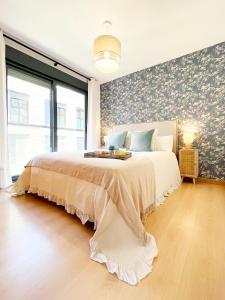 Llit o llits en una habitació de MálagadeVacaciones - Puerto