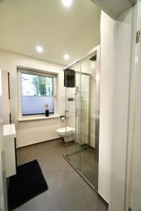 Koupelna v ubytování Ferienwohnung Nordlicht + 16 fotografií