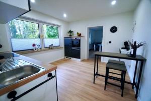 Kuchyň nebo kuchyňský kout v ubytování Ferienwohnung Nordlicht