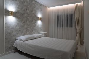Katil atau katil-katil dalam bilik di Apartamento mar&menta