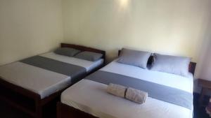 Ένα ή περισσότερα κρεβάτια σε δωμάτιο στο Serendib House - Sinharaja