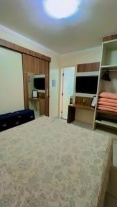 Cama o camas de una habitación en Flat Diroma Lacqua