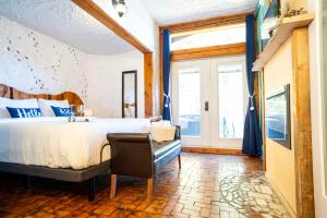 Postel nebo postele na pokoji v ubytování Homer Inn & Spa