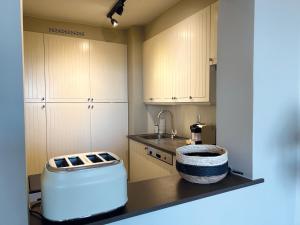 Een keuken of kitchenette bij Eden-Beach