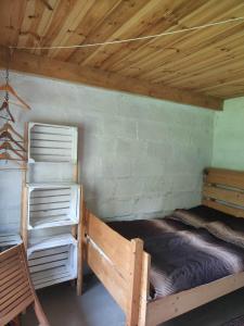 Postel nebo postele na pokoji v ubytování Siedlisko Urszulanka /Gajki