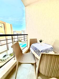 Postel nebo postele na pokoji v ubytování Charmant Appartement à Hammamet- Résidence Bousten 2