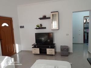 TV a/nebo společenská místnost v ubytování Amar Seaside