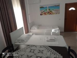 Postel nebo postele na pokoji v ubytování Amar Seaside