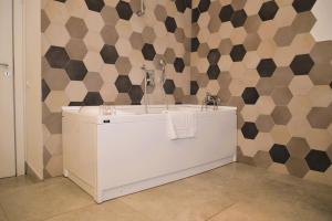 Φωτογραφία από το άλμπουμ του Vinyls' Green Home - Toledo Centro Storico στη Νάπολη +19 φωτογραφίες