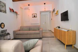 Μια τηλεόραση ή/και κέντρο ψυχαγωγίας στο Vinyls' Green Home - Toledo Centro Storico