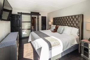 מיטה או מיטות בחדר ב-Jack S'Bearo - Slopeside at Pico