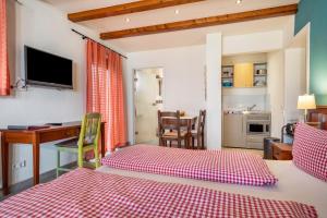 Ein Bett oder Betten in einem Zimmer der Unterkunft Obst- Ferienhof Ragg