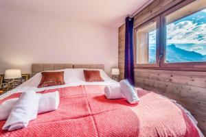 Katil atau katil-katil dalam bilik di Résidence Lodge Des Neiges C - Pièces 011
