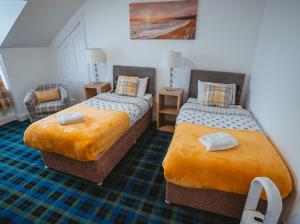 Кровать или кровати в номере Nairn View Guest House
