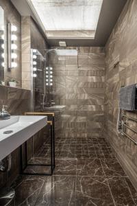 Koupelna v ubytování Manto Loft style apartment + 16 fotografií