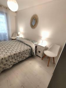 Posteľ alebo postele v izbe v ubytovaní Appartement 2 Pièces avec une grande terrasse, 3 étoiles, Wifi, Box pour véhicule et vélos