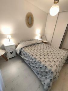 Posteľ alebo postele v izbe v ubytovaní Appartement 2 Pièces avec une grande terrasse, 3 étoiles, Wifi, Box pour véhicule et vélos