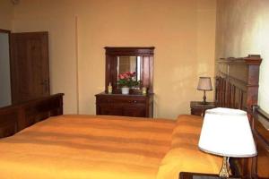 Postel nebo postele na pokoji v ubytování Agriturismo Corte Virgiliana