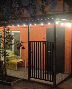 a front door of a house with lights on it at Salve Rooms(tabidze) in Tbilisi City