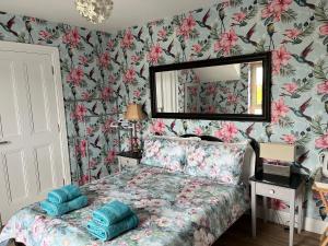 Letto o letti in una camera di Robins Nest