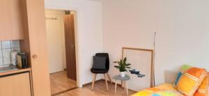 Kuchyň nebo kuchyňský kout v ubytování Proche de la cathédrale, logement