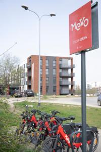 a bunch of bikes parked next to a sign at APARTAMENT BOHO in Gdańsk