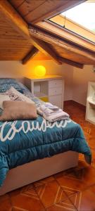 Postel nebo postele na pokoji v ubytování the Wooden Roof