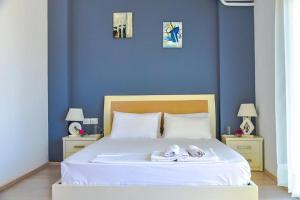 Postel nebo postele na pokoji v ubytování Privé City Hotel