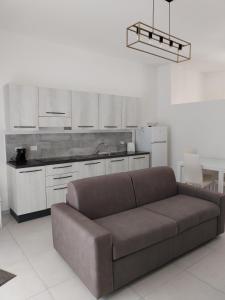 Appartamento Suite Antiche Terme - Zero Barriere tesisinde mutfak veya mini mutfak