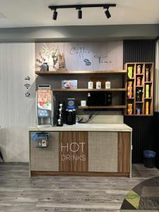 a hot drinks counter in a coffee shop at D'Garden Hotel Kuala Lumpur in Kuala Lumpur